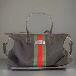 GUCCI
Pre-Loved Black Techno Canvas Web Duffle